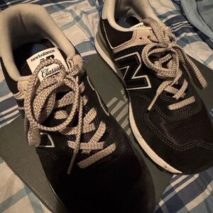 New Balance Black and White Athletic Shoes